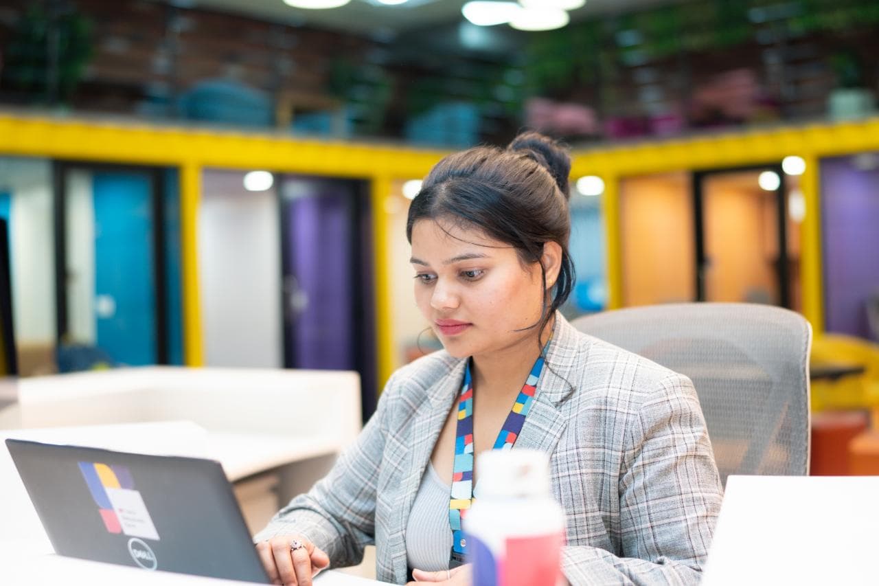 Employee working at a desk with a computer